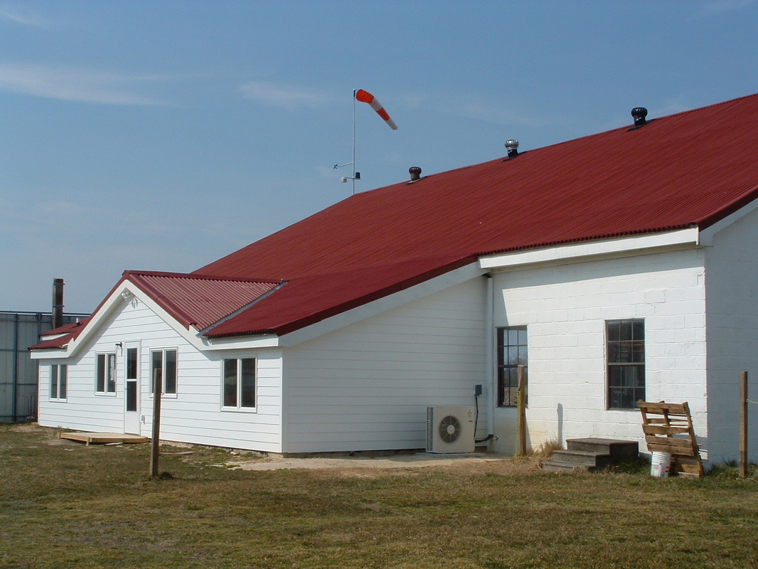A Tidewater Soaring Society club glider on the field.